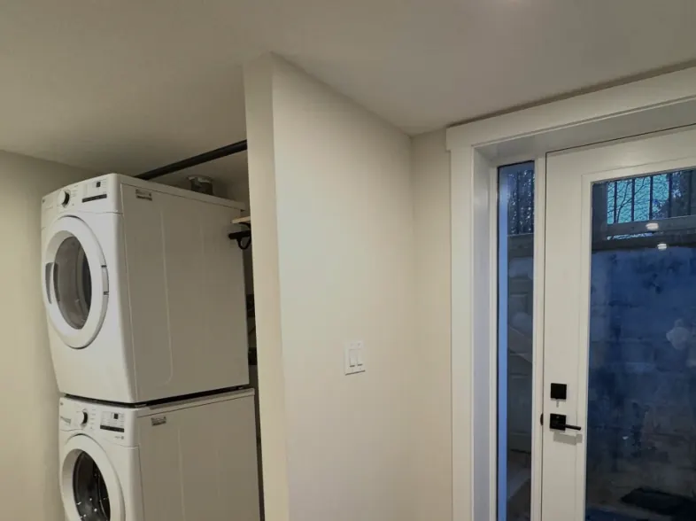 Basement suite laundry and entry area