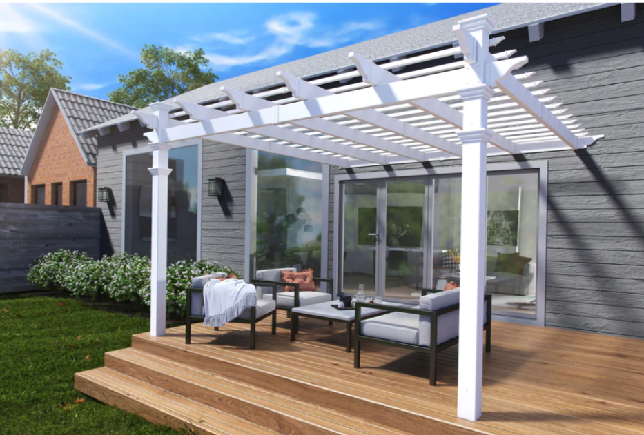 White pergola over a cedar deck with outdoor lounge seating and modern furniture